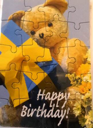 Karte Puzzle Happy Birthday! Teddybär mit Paket